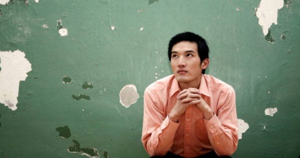 thinking asian man