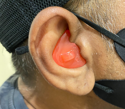 custom-swim-plugs-in-red.png